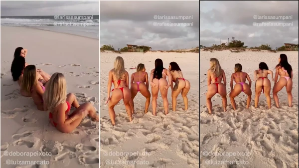 Larissa Sumpani e suas amigas brasileiras de biquíni na areia da praia