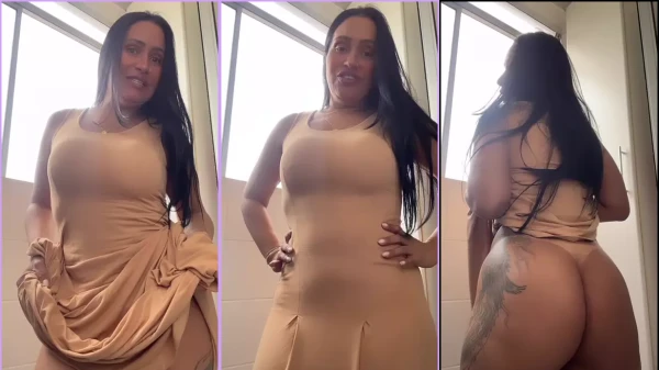 Alessandra Marques de vestido, destacando o tamanho do seu trasero
